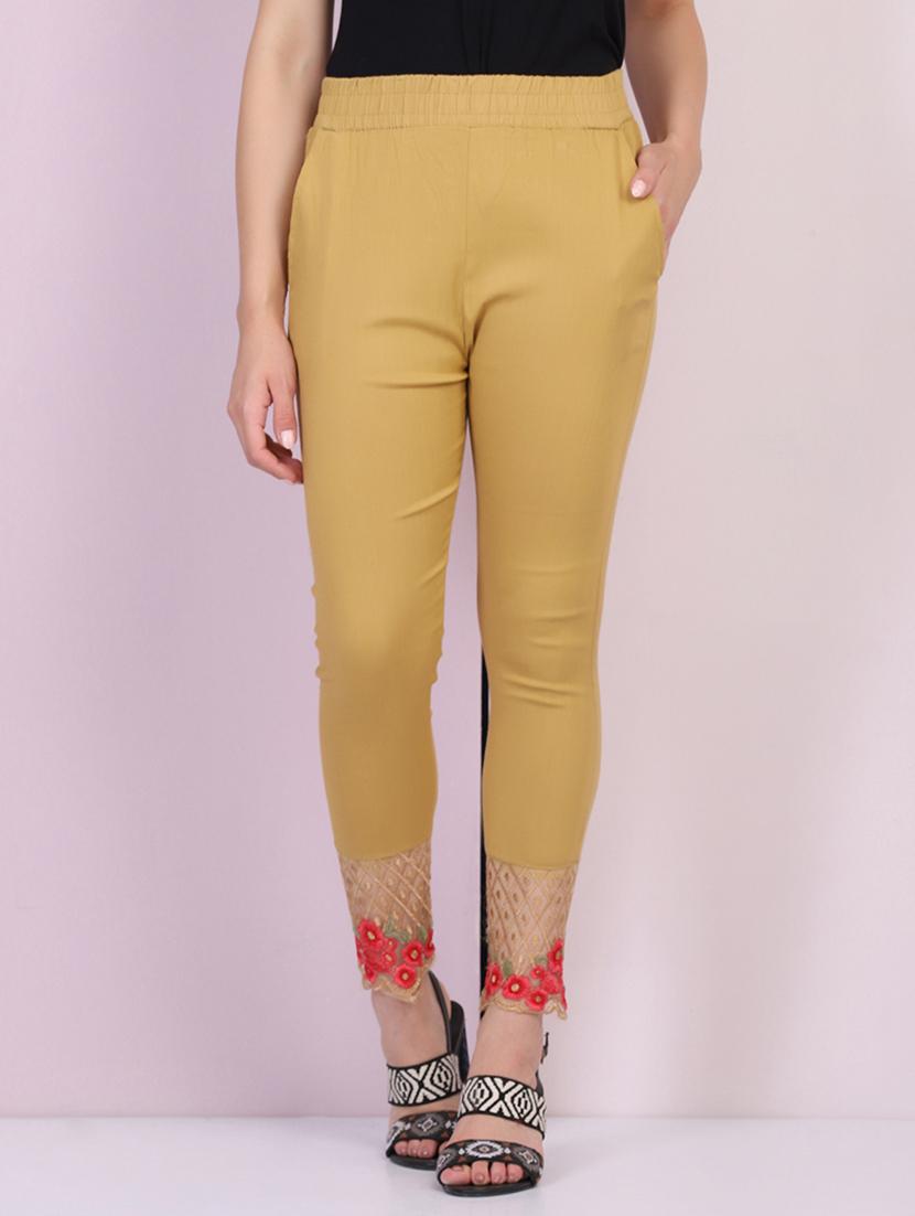 women solid mid rise ankle length tapered pant