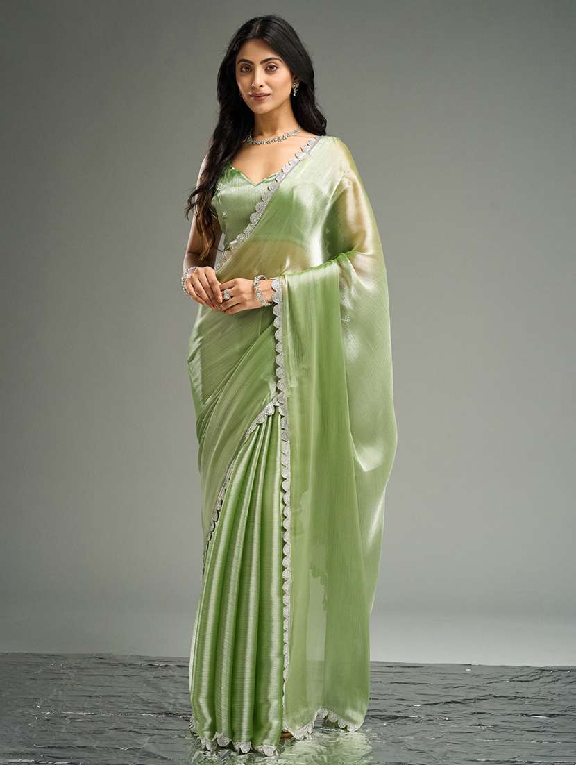 women solid embellished bordered saree with blouse