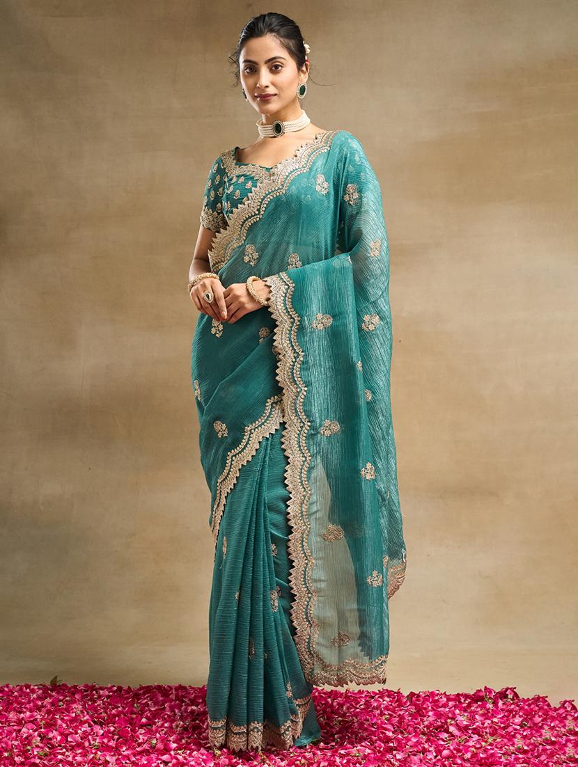 women solid with work embroidered saree with blouse
