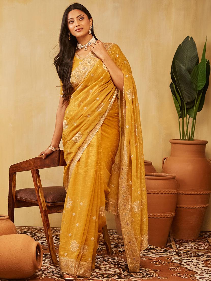 women solid with work embroidered saree with blouse