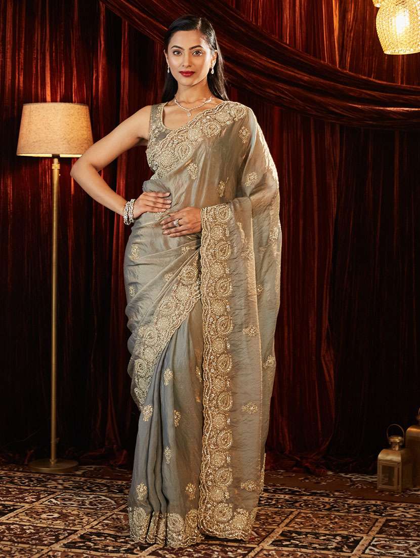 women solid with work embroidered saree with blouse