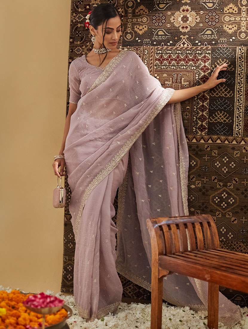 women solid with work embroidered saree with blouse