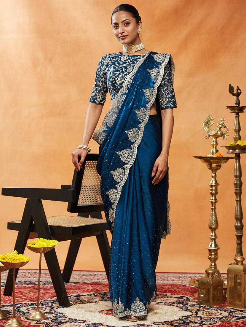 women solid with work embroidered saree with blouse