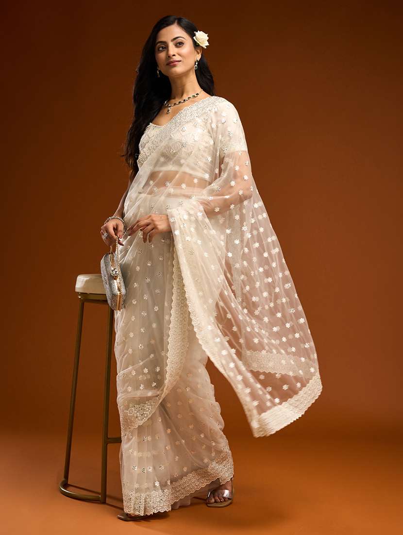 women solid with work embellished saree with blouse