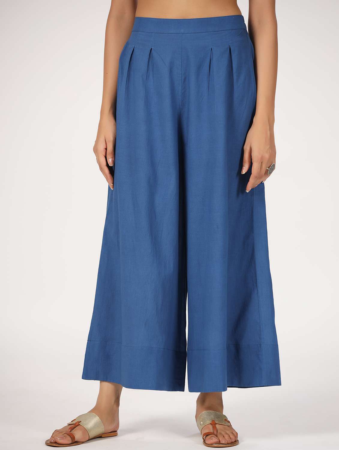 women blue solid mid rise flared palazzo