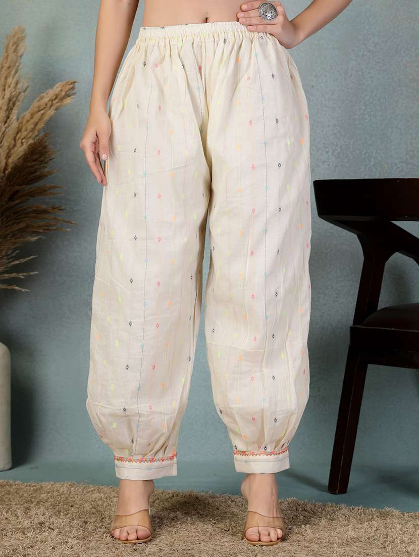 women cream self design mid rise salwar