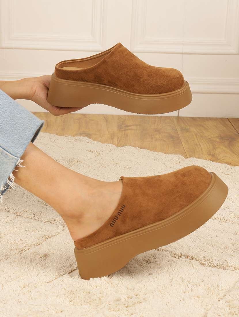 women tan slip on mule