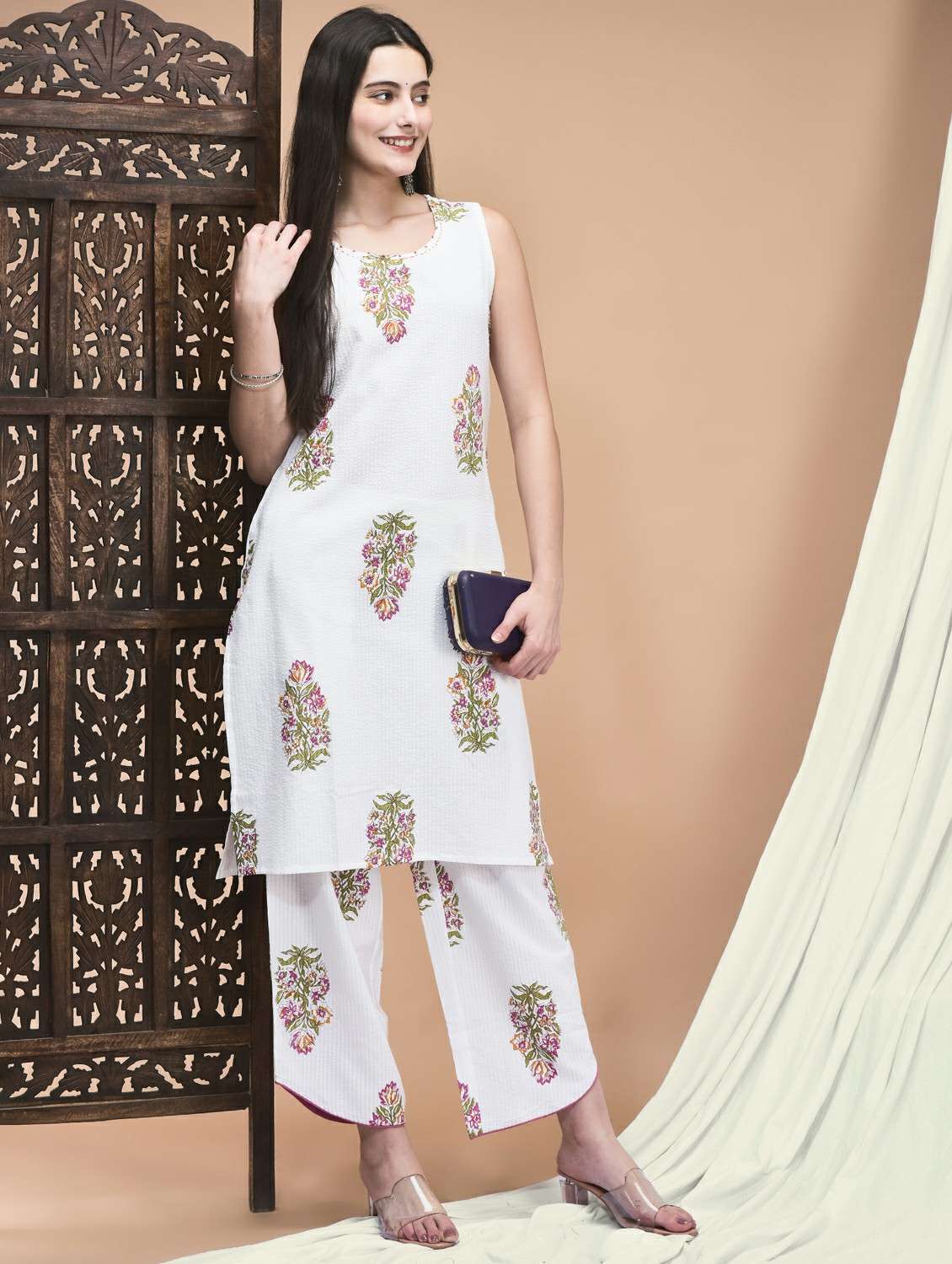 women white sleeveless kurta palazzo set