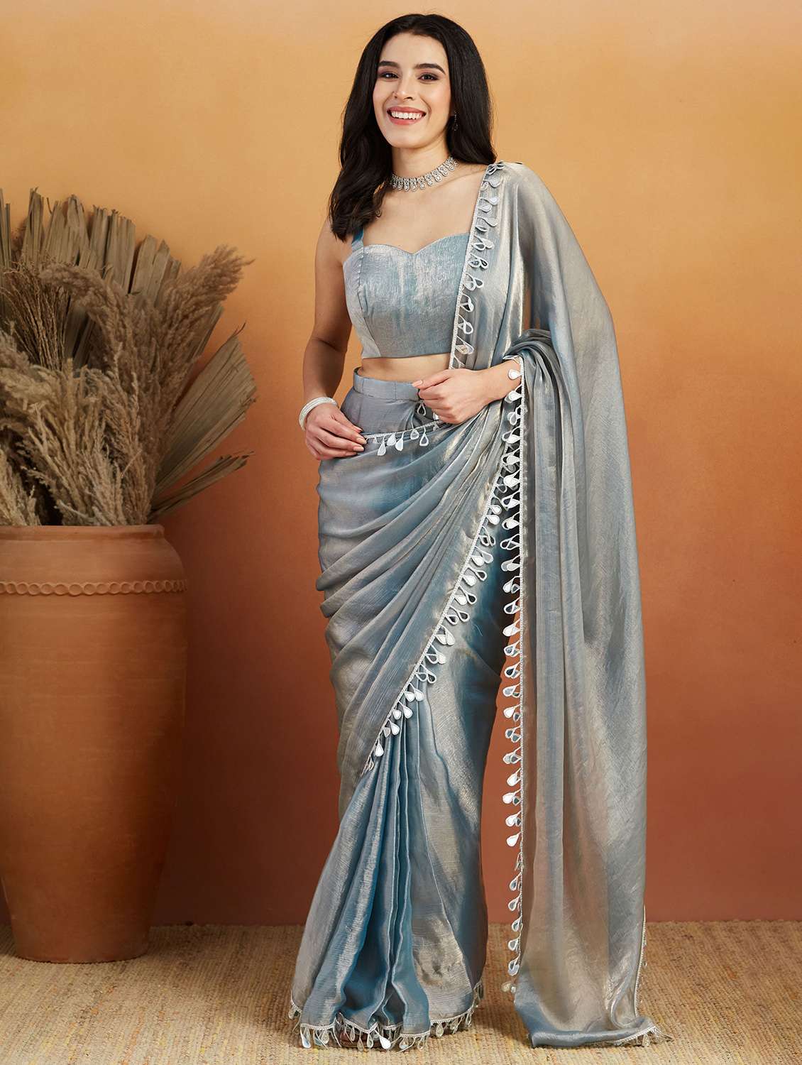 women solid with embellished bordered ready to wear saree with blouse