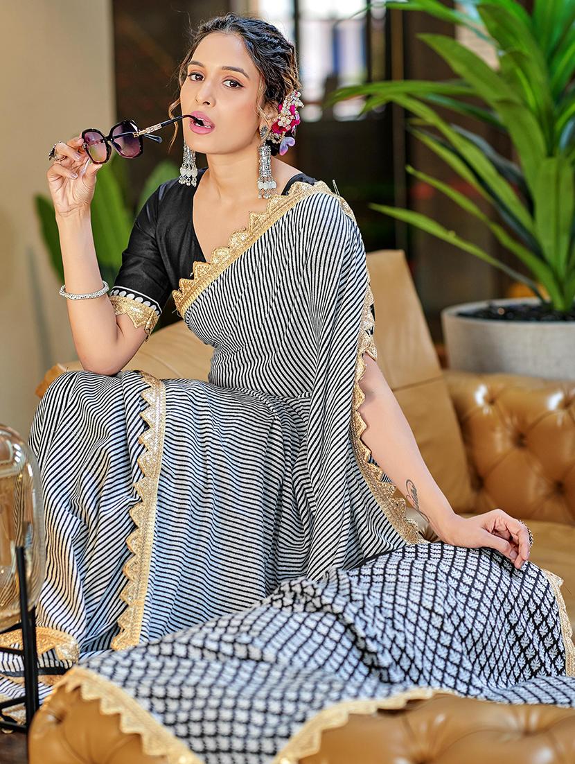 women printed casual wear saree with blouse - 21961396 -  Zoom Image - 0
