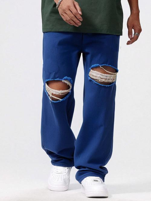 men slash knee mid rise full length baggy jeans - 21961631 -  Standard Image - 0