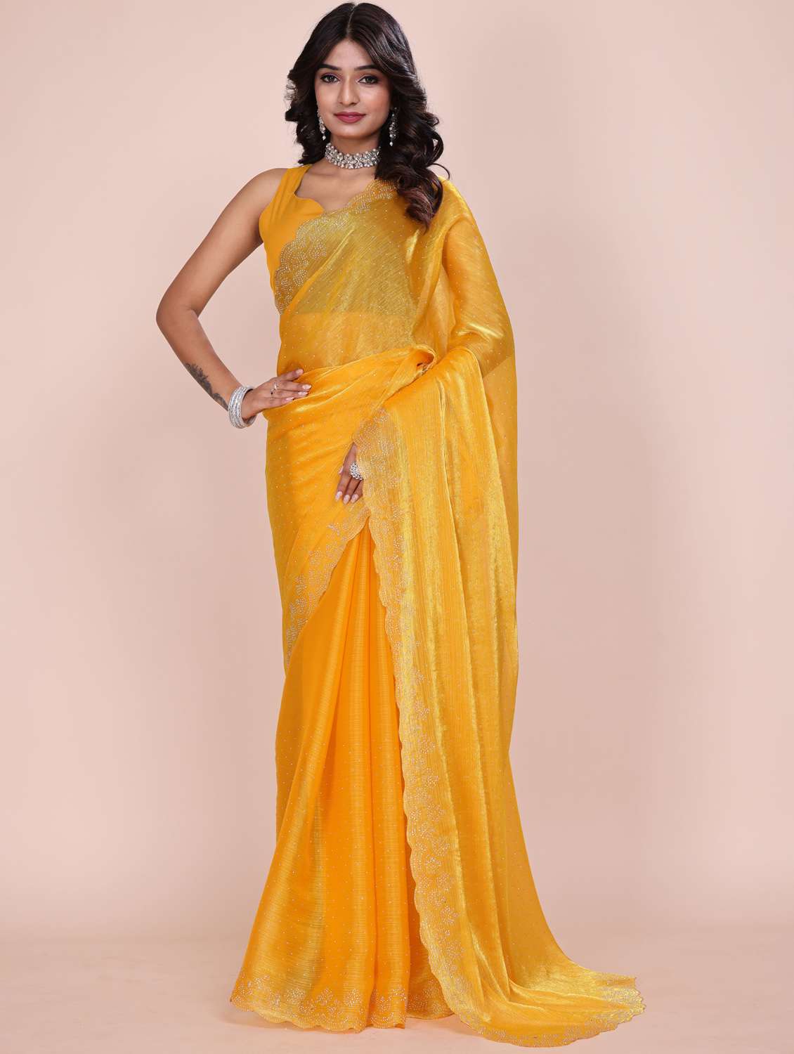 women solid with work embellished saree with blouse