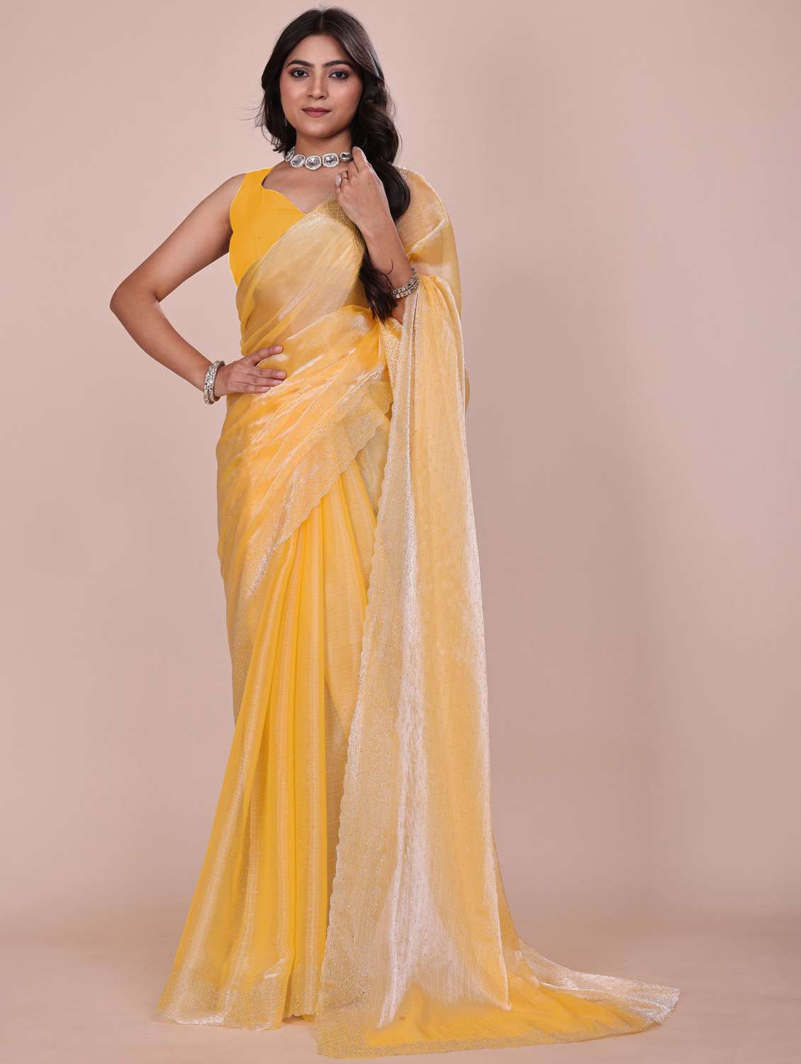 women solid with work embellished saree with blouse