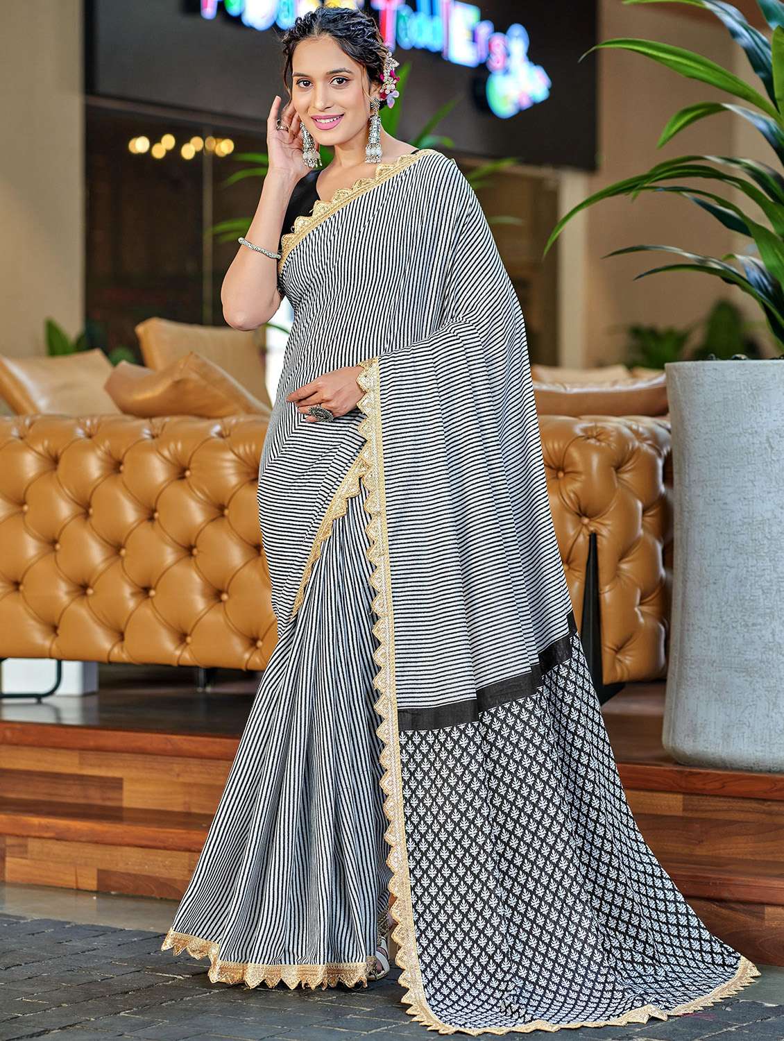 women striped printed saree with blouse - 21962973 - Zoom Image - 0