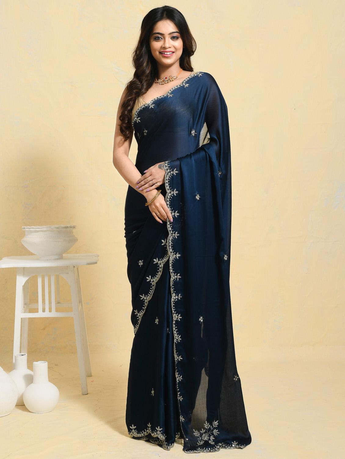 women solid with work embellished saree with blouse
