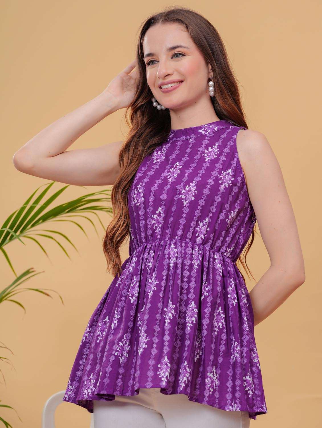 women purple printed sleeveless peplum ethnic top