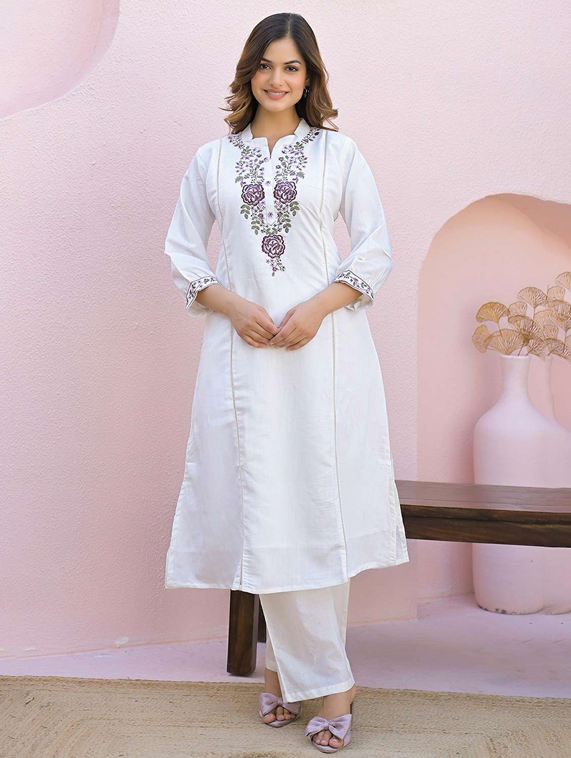 women embroidered three quarter sleeve a-line kurta