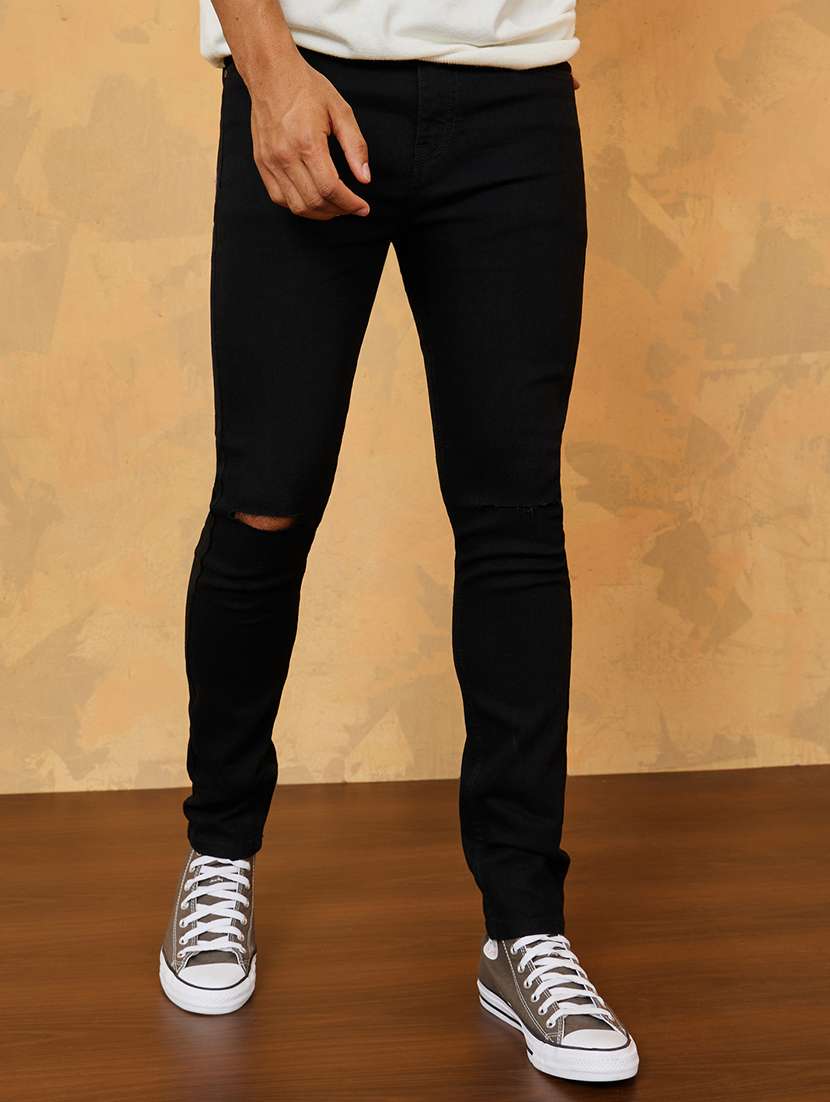 men solid mid rise slash knee skinny fit jeans