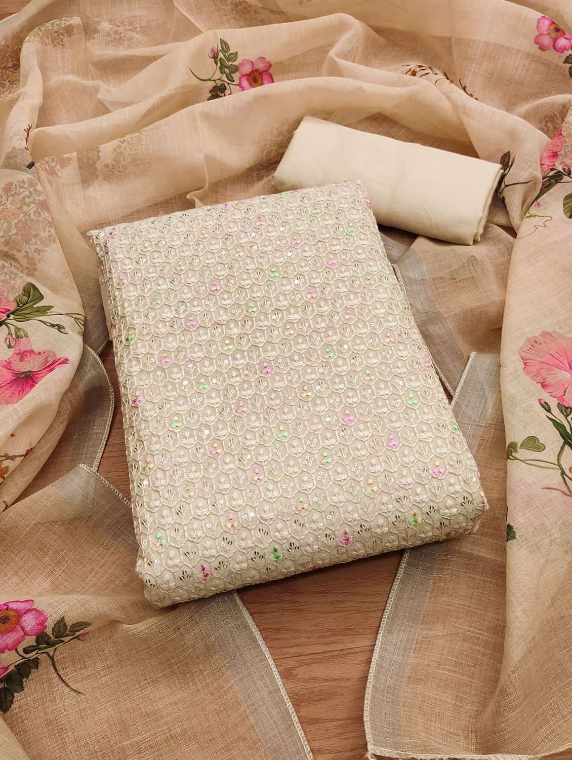 women embroidered unstitched suit set