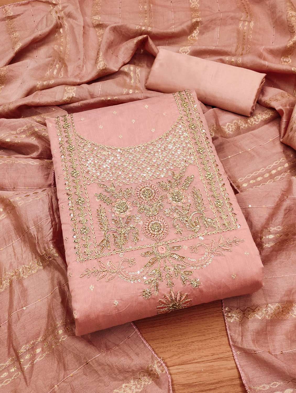 women embroidered unstitched suit set