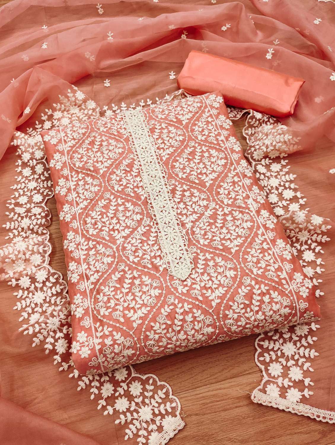 women embroidered unstitched suit set