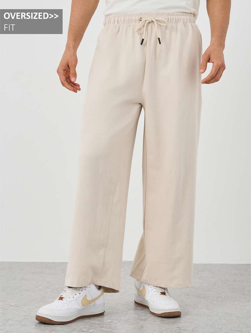 men solid mid rise relaxed fit track pant