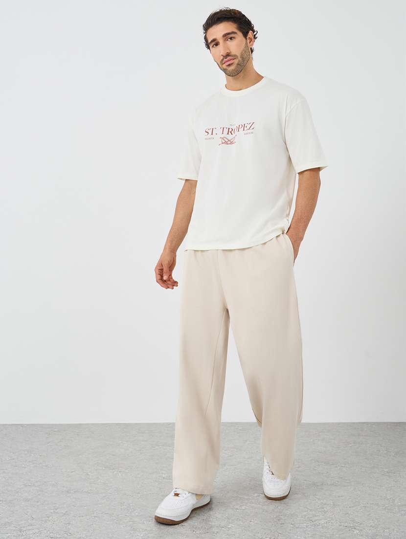 men solid mid rise relaxed fit track pant - 21971566 -  Standard Image - 3