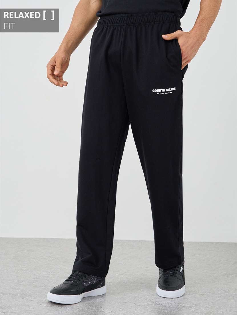 men solid mid rise relazed fit track pant - 21971567 -  Zoom Image - 0