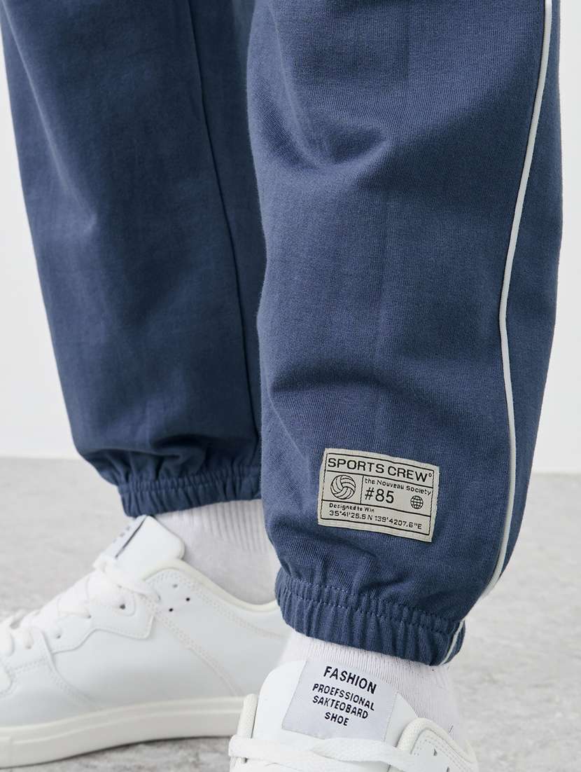 men typographic mid rise relaxed fit jogger - 21971572 - Standard Image - 5