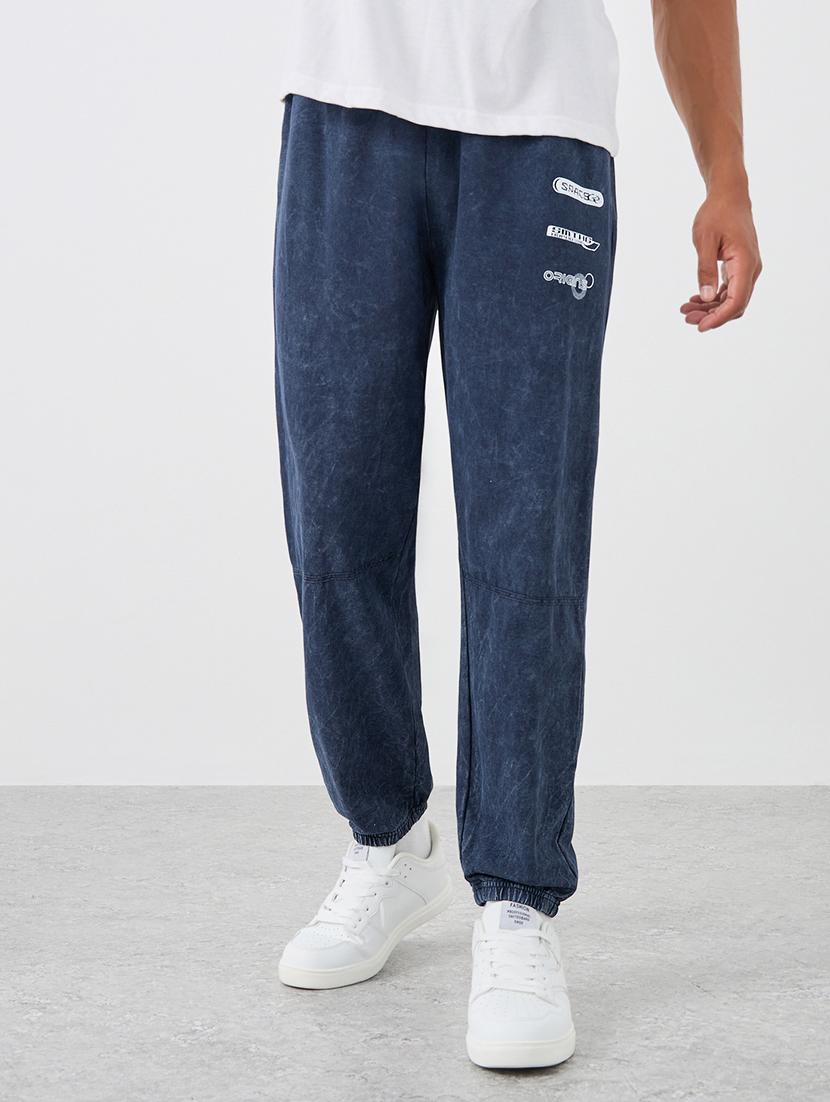 men navy blue placement print relaxed fit jogger
