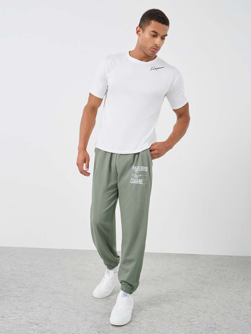 men placement print mid rise relaxed fit jogger - 21971580 -  Standard Image - 3