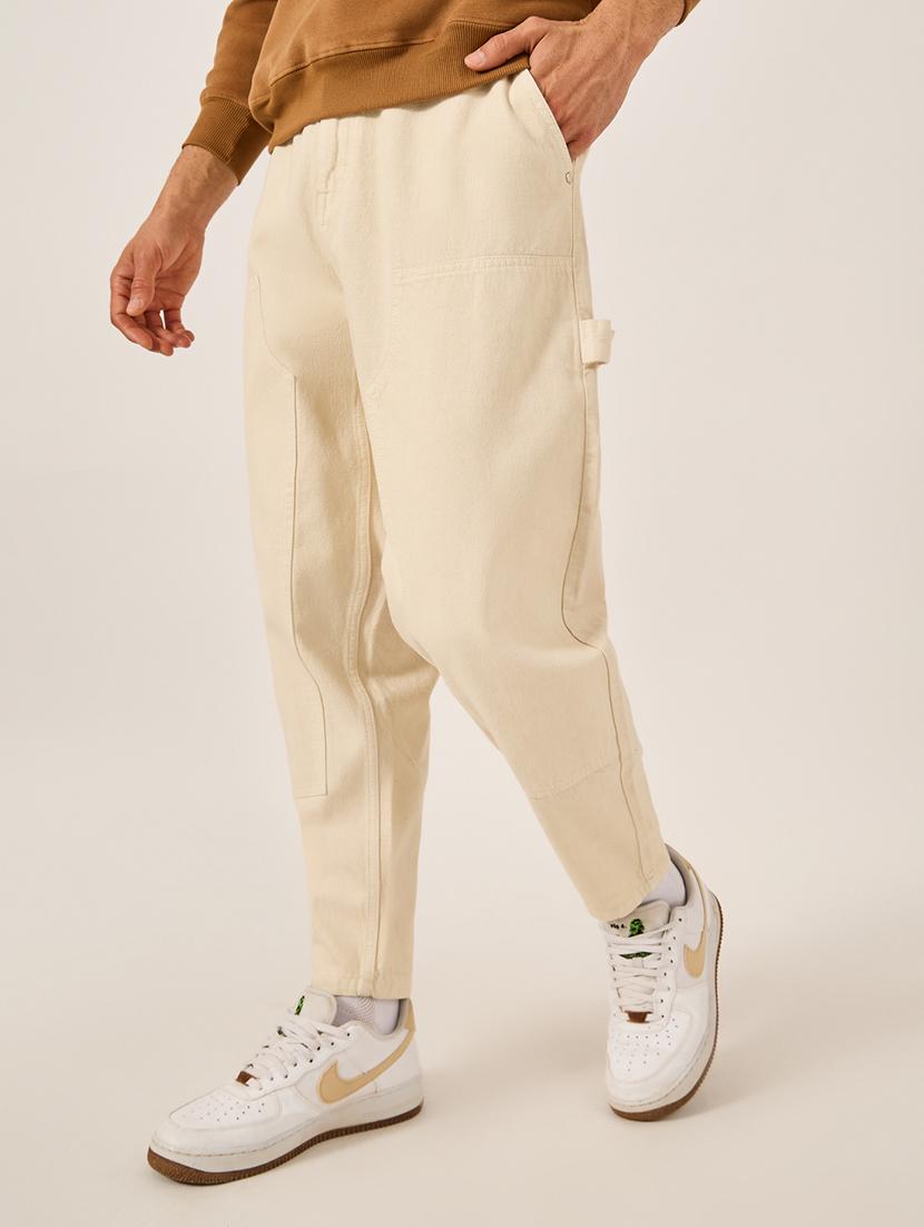 men cream solid mid rise relaxed fit jeans - 21971593 -  Zoom Image - 0