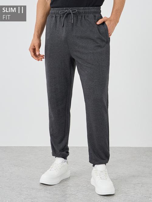 men solid mid rise slim fit jogger - 21971632 -  Standard Image - 0