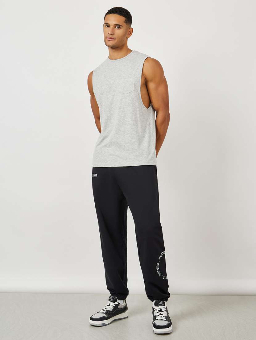 men placement print mid rise relaxed fit jogger - 21971694 -  Standard Image - 3