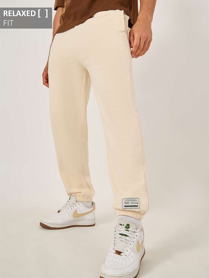 men solid mid rise relaxed fit jogger