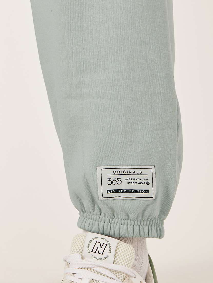 men solid mid rise relaxed fit jogger - 21971743 -  Standard Image - 3