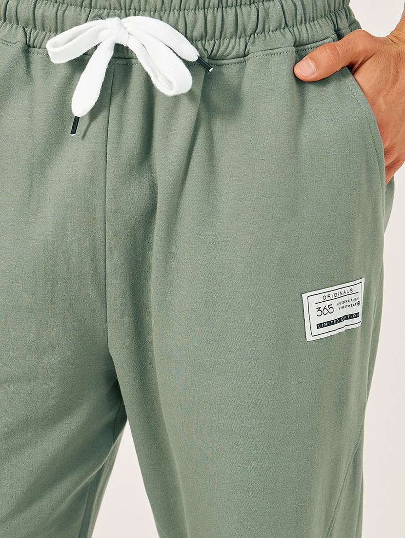 men solid mid rise relaxed fit jogger - 21971746 - Standard Image - 3