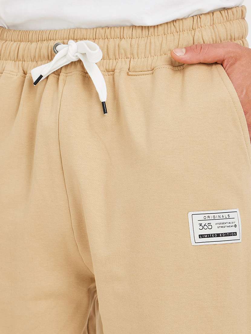 men solid mid rise relaxed fit jogger - 21971748 - Standard Image - 3