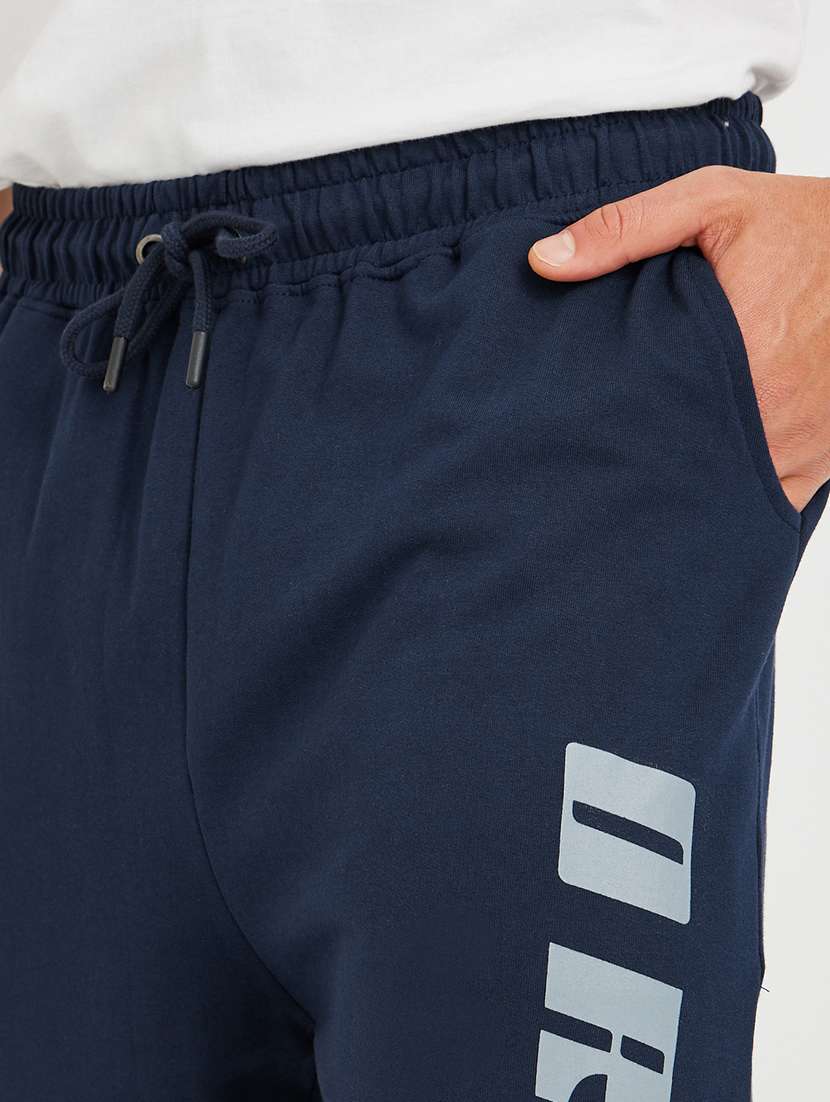 men printed mid rise relaxed fit jogger - 21971756 -  Standard Image - 3