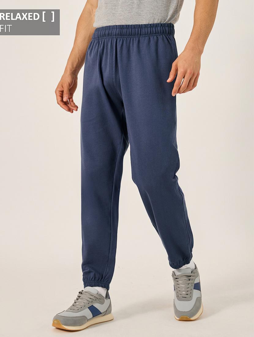 men solid mid rise relaxed fit jogger - 21971757 - Zoom Image - 0