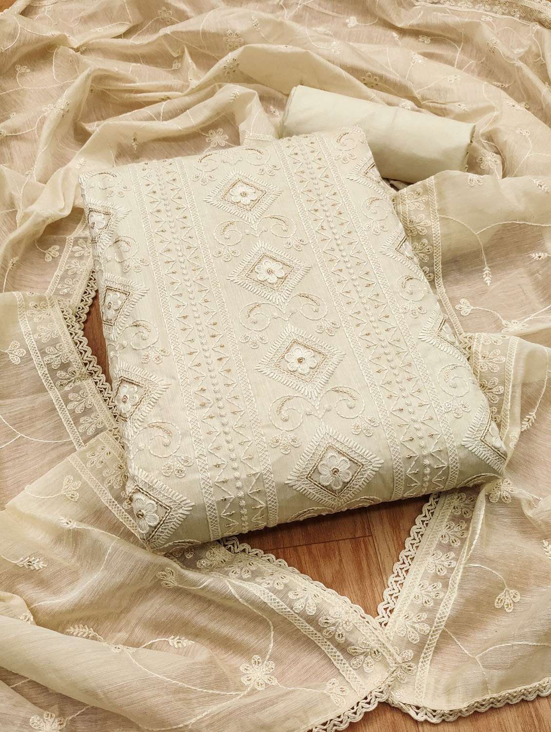 women solid with work embroidered unstitched suit set