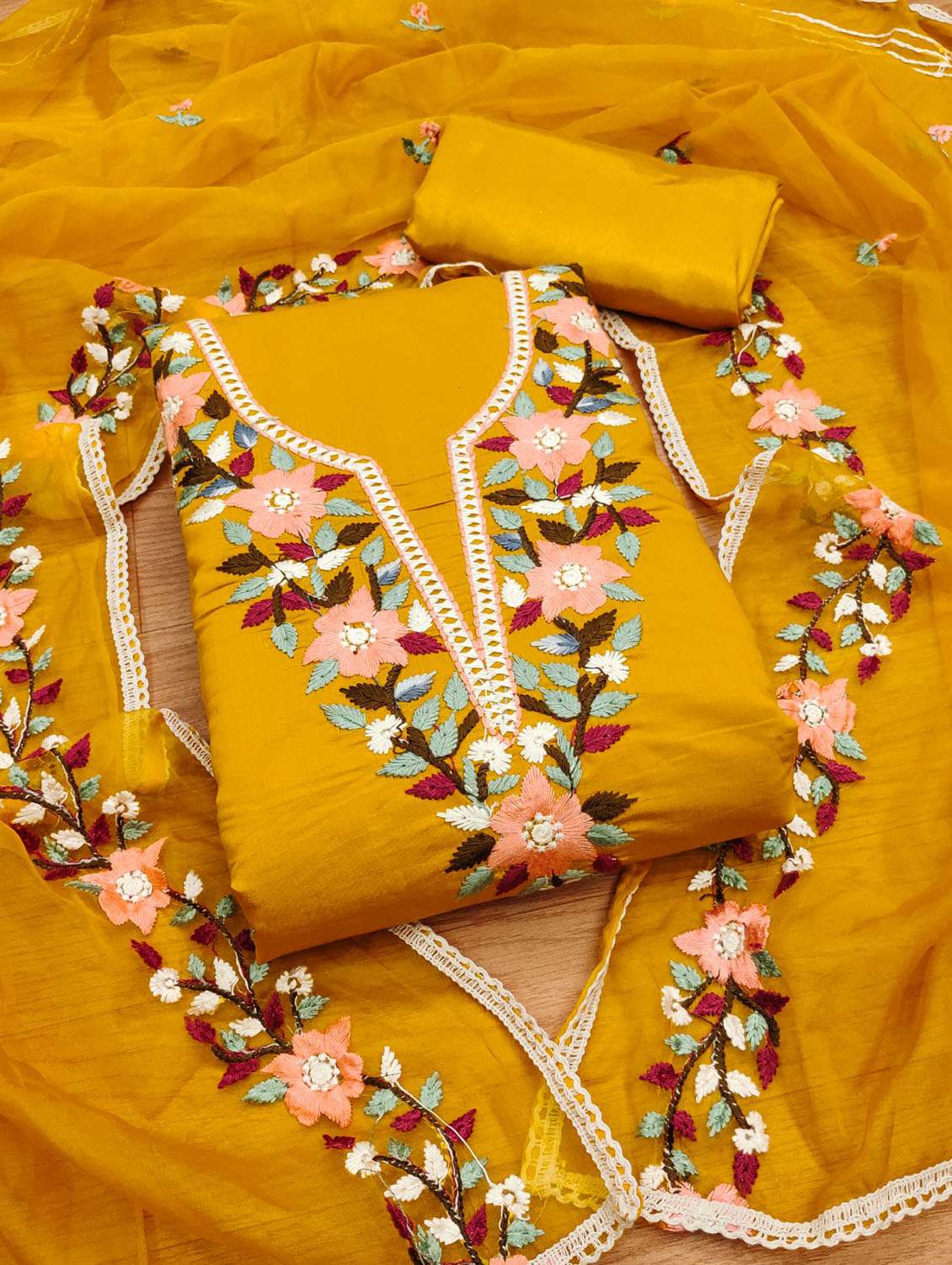 women solid with work embroidered unstitched suit set