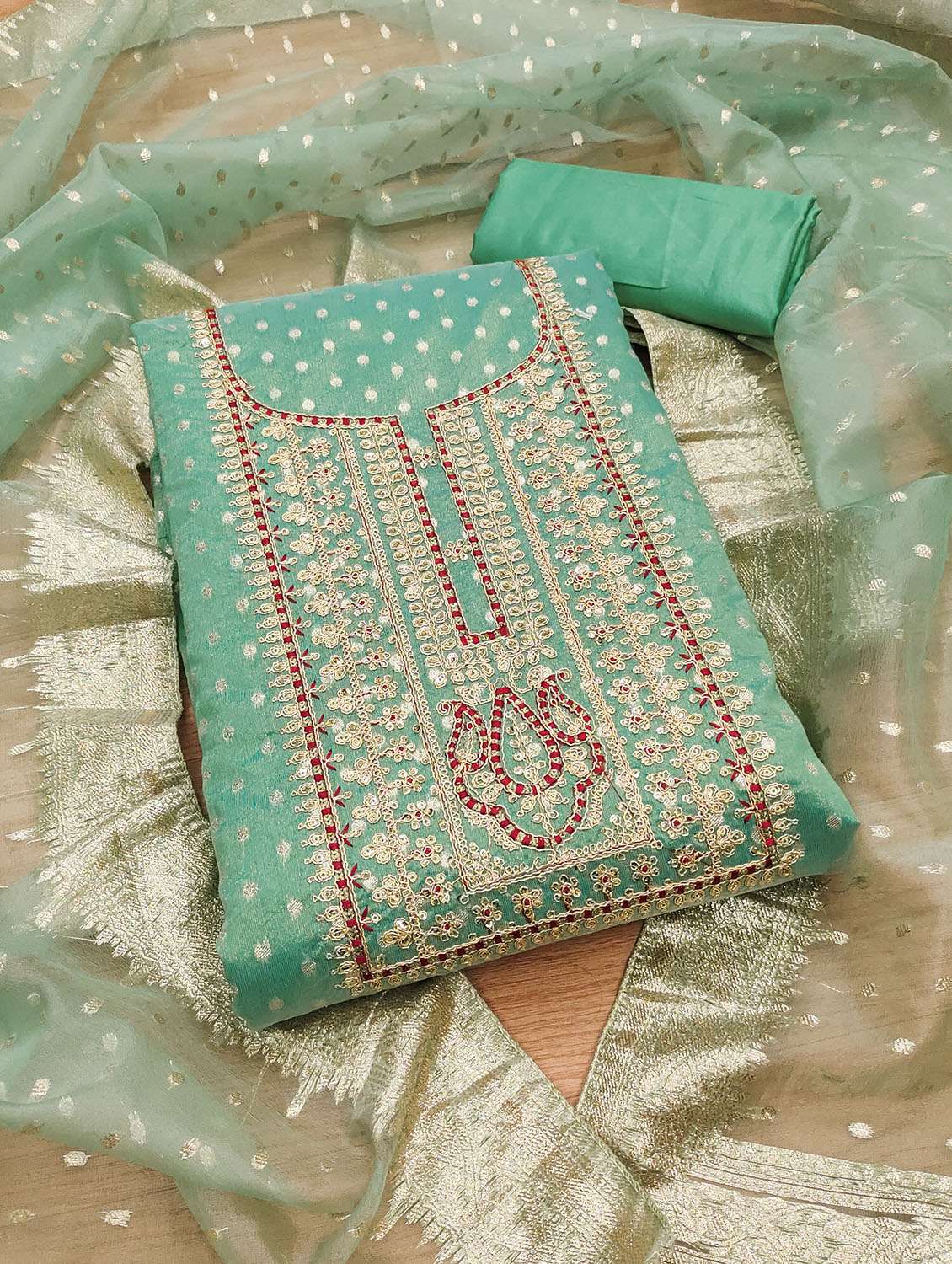 women self design embroidered unstitched suit set