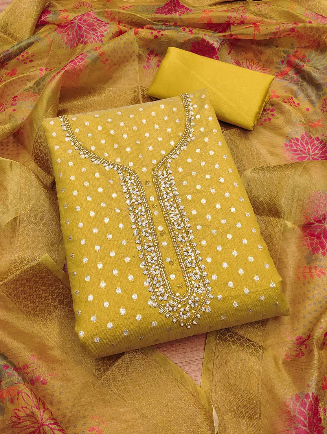 women self design embroidered unstitched suit set