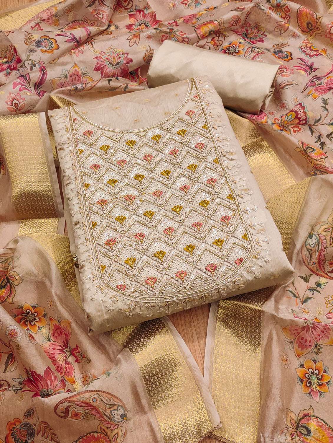 women self design embroidered unstitched suit set