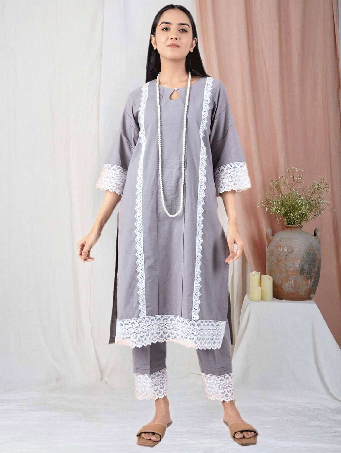 women solid with work three quarter sleeve a-line kurta