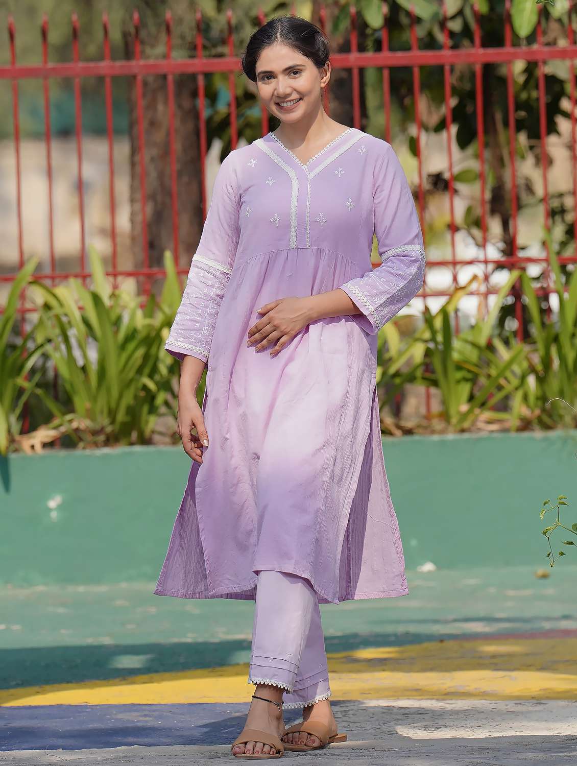 women solid with work three quarter sleeve a-line kurta
