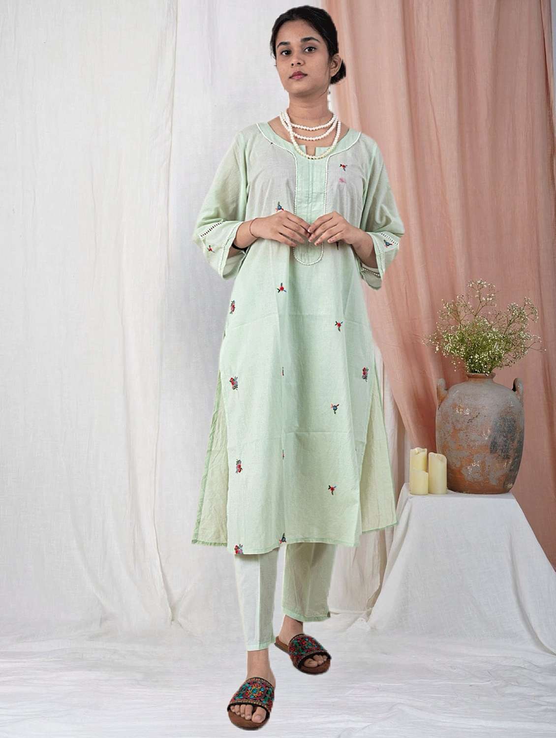 women solid with work three quarter sleeve a-line kurta