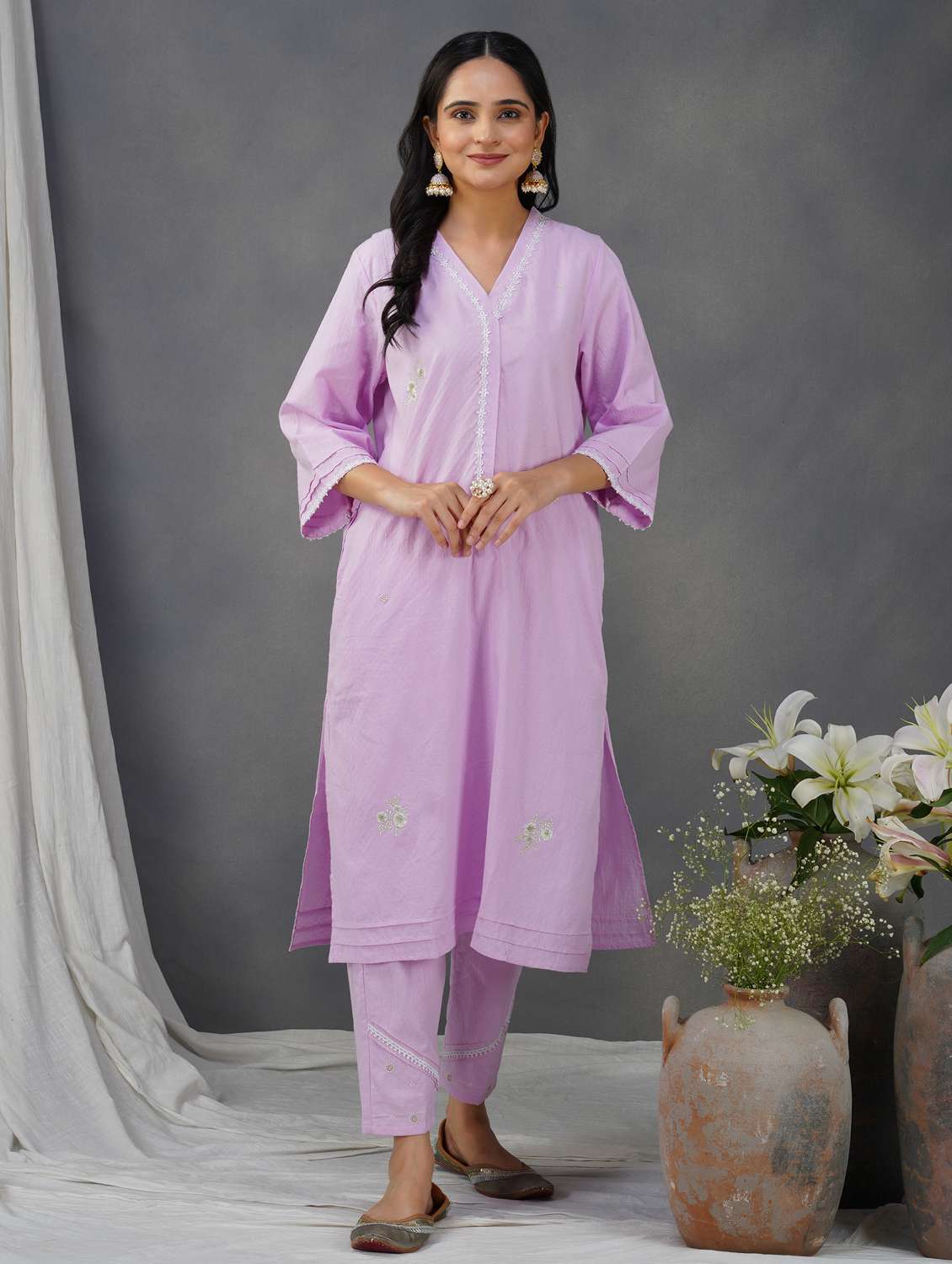 women solid with work three quarter sleeve a-line kurta