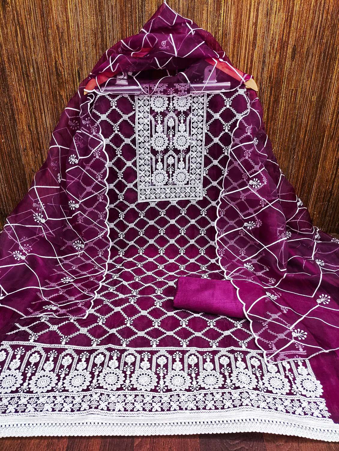 women solid with work embroidered unstitched suit set